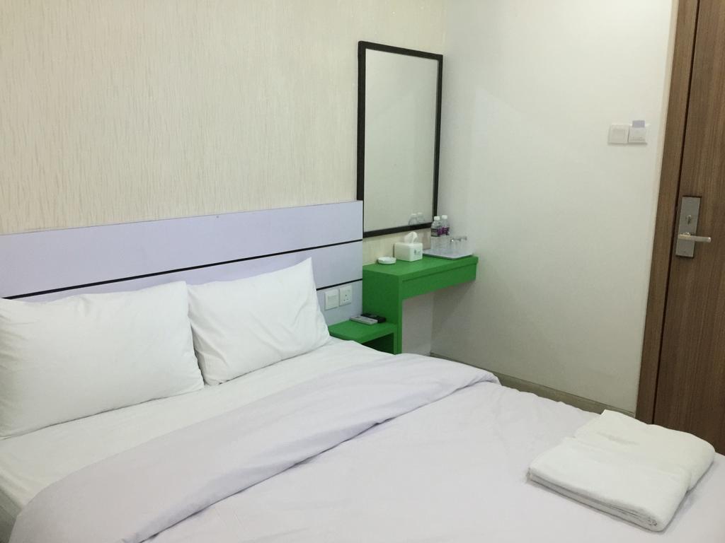 Redlink Hotel Batam Kamer foto